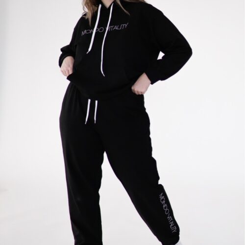 Plus size joggers from cotton blend in black colour from the front