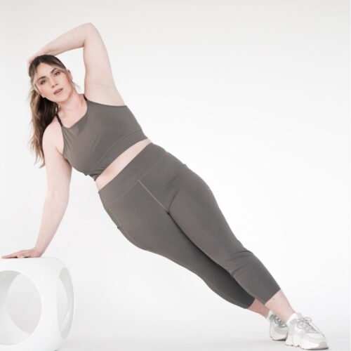 Plus size high impact leggings with a pocket in brown grey colour from the front