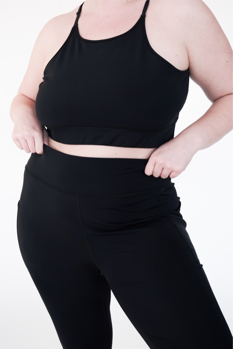 Plus size high performance sports bra in black colour from the front