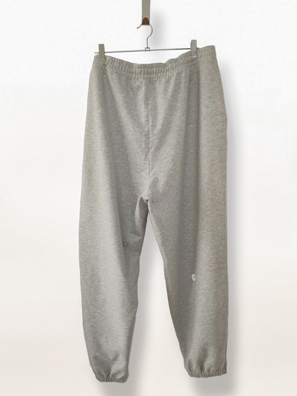 Plus size joggers from cotton blend in grey colour from the back