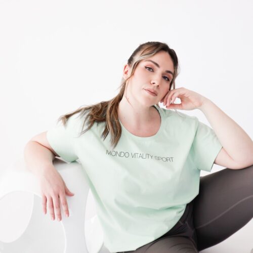 Oversize t-shirt from cotton blend in green colour close logo view